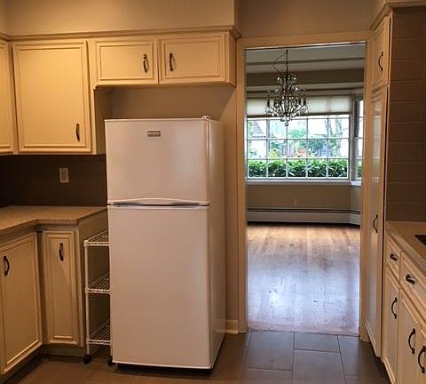 Kitchen looking into Dining Room- view of street