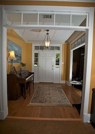 Inviting entry foyer with wood floors.
