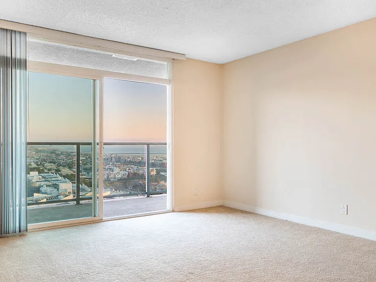 Carpeted Bedroom and Balcony