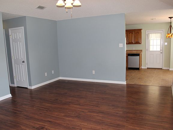 Living room looking into kitchen