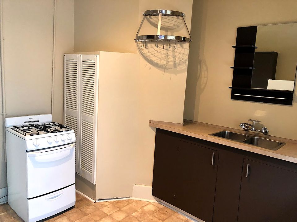 Sink with large storage area below.
Pot/pan holder included.