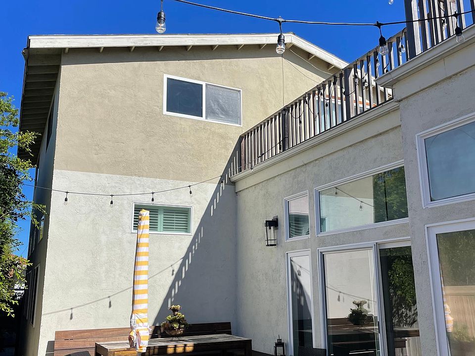 View of bedroom window & deck railing (upstairs) from the family residence on the first floor. Apartment is all second floor. Family residence is all first floor.