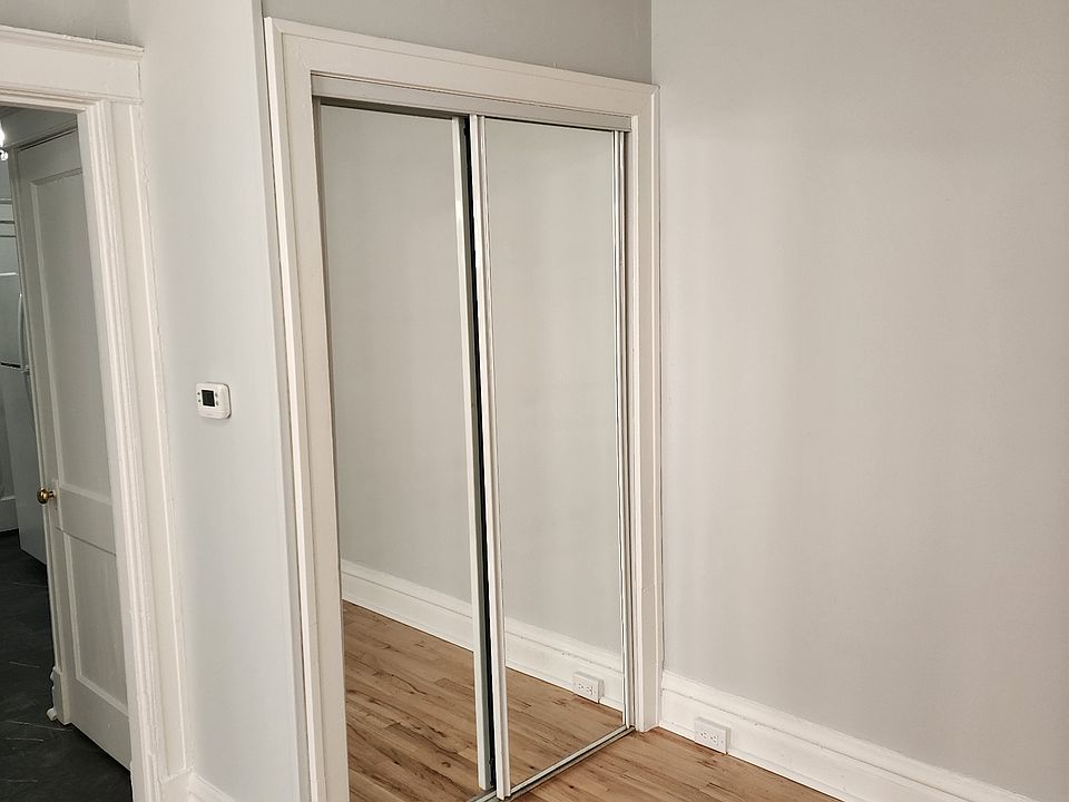 Mirrored Closet in the middle room for extra hanging space.