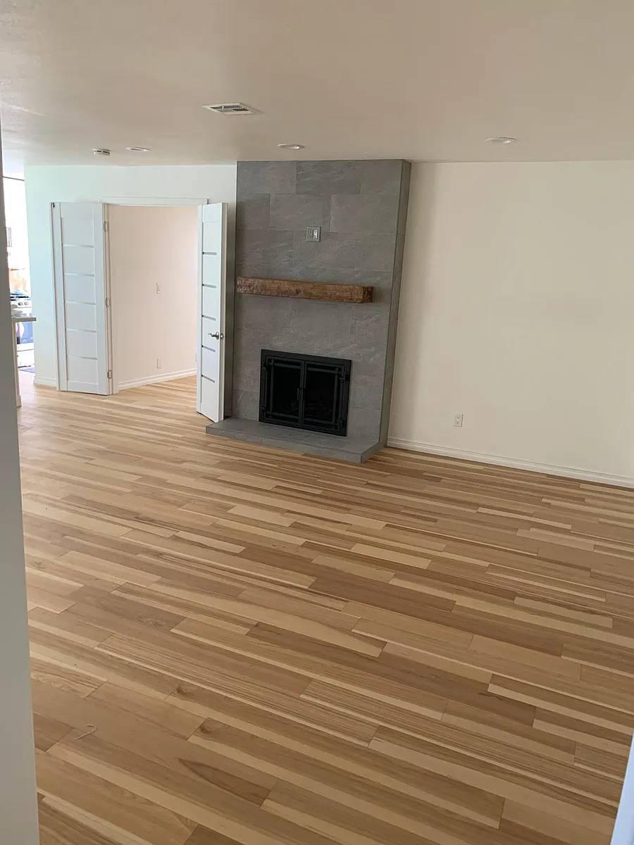 Living room with fireplace - E Broadway