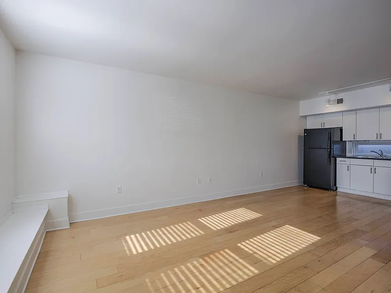 Wood flooring with great natural lighting in a townhome at The Sawyer.