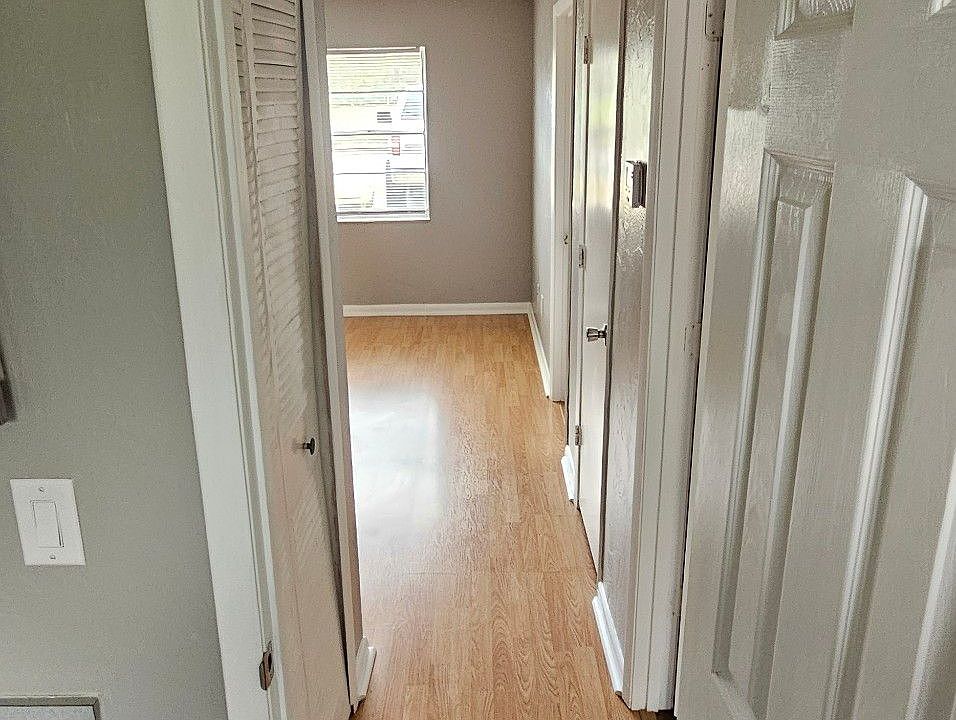 Hallway from living space to bathroom