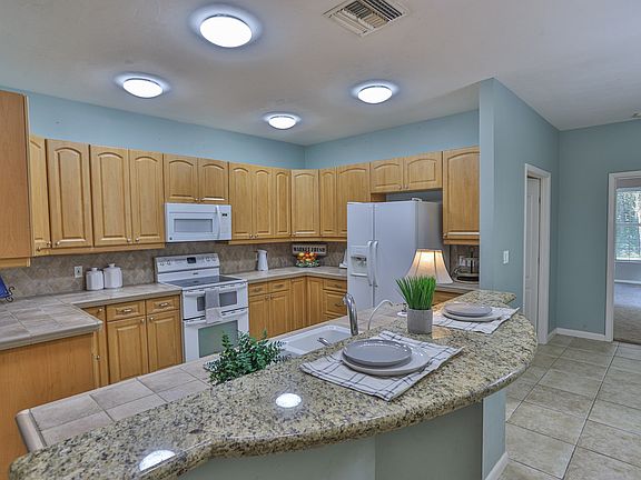 4th image of 8891 NW 50th Ave