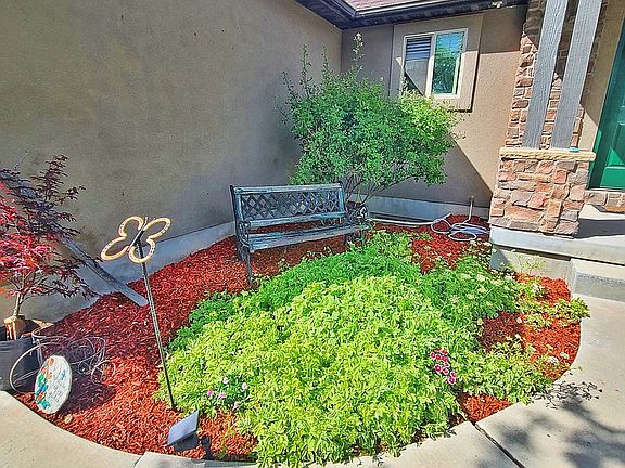Flower bed by front door.