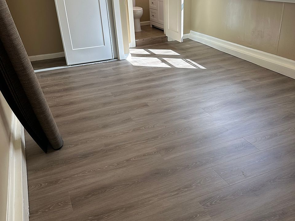 Primary bedroom with attached half bath.