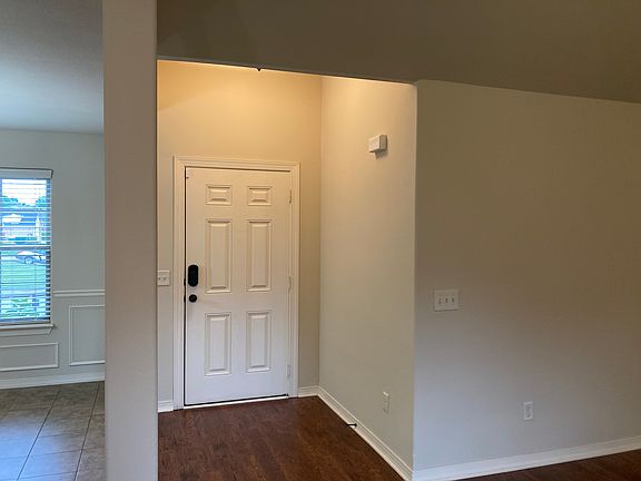 Front Door Entrance & Partial of Dinning Room #1