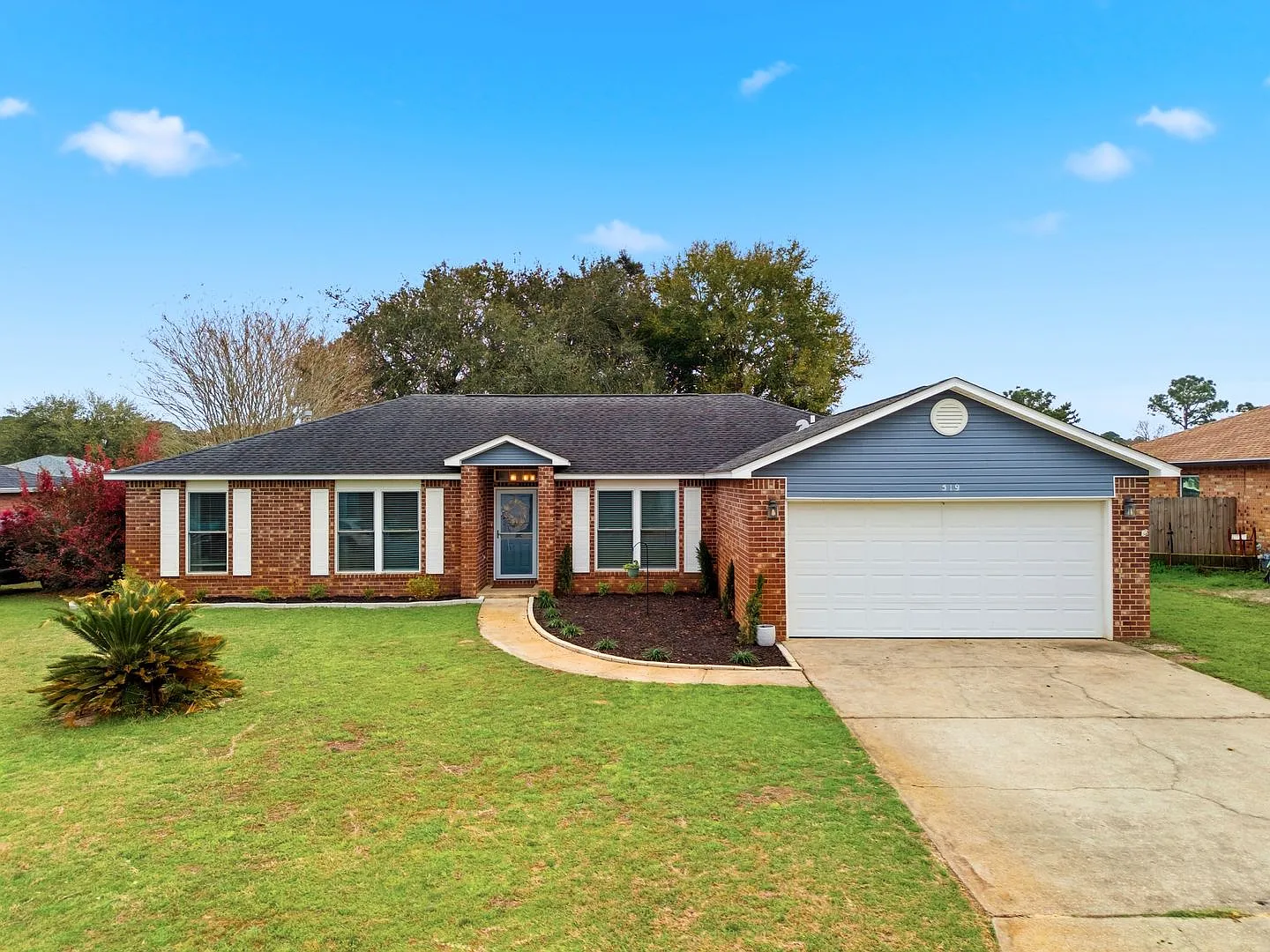 Welcome to This Beautifully Maintained 4/2 Brick Home by the Base! — Photo 1