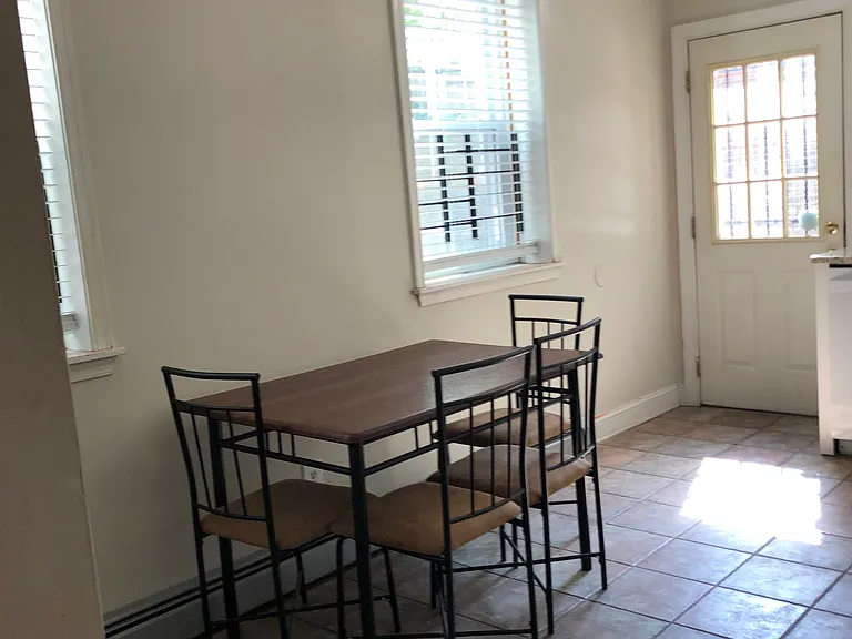 Eat in kitchen with rear yard access.