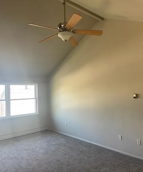 Large third floor bedroom with vaulted ceiling