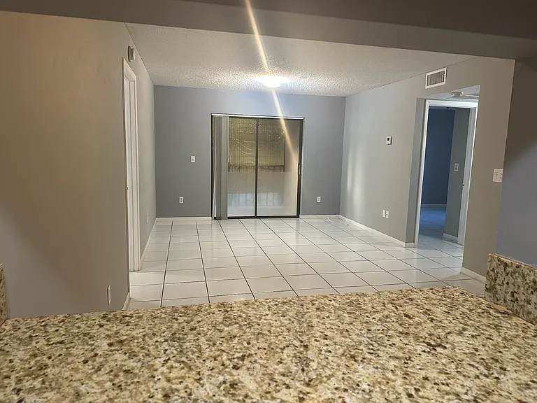 View of the living room and dining room from the kitchen