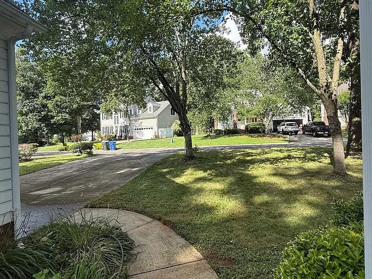 View of walkway and driveway and Tysons Forest Dr