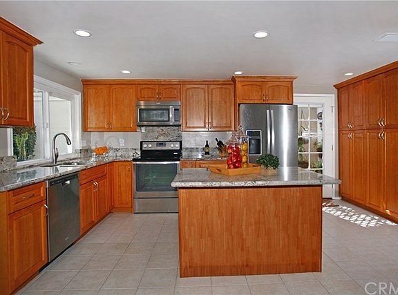Remodeled kitchen with stainless steel appliances