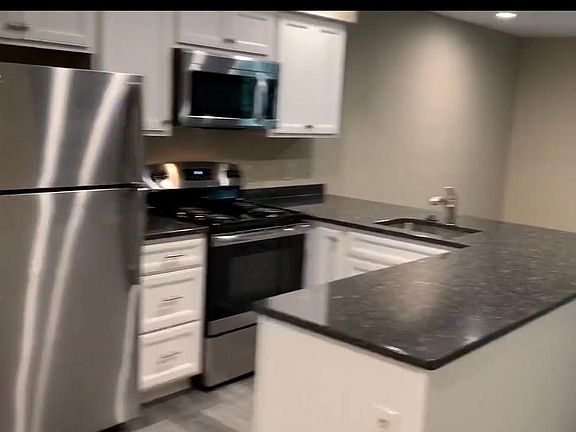 Completely updated kitchen with granite/stainless appliances