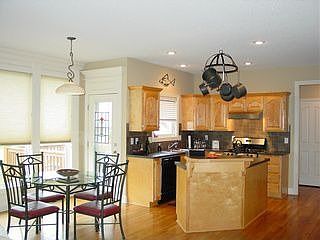 Recipe for Success:  Kitchen with breakfast bar, pantry closet and eat-in area