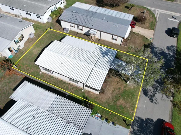 1212 Paurotis Drive, Barefoot Bay, FL 32976