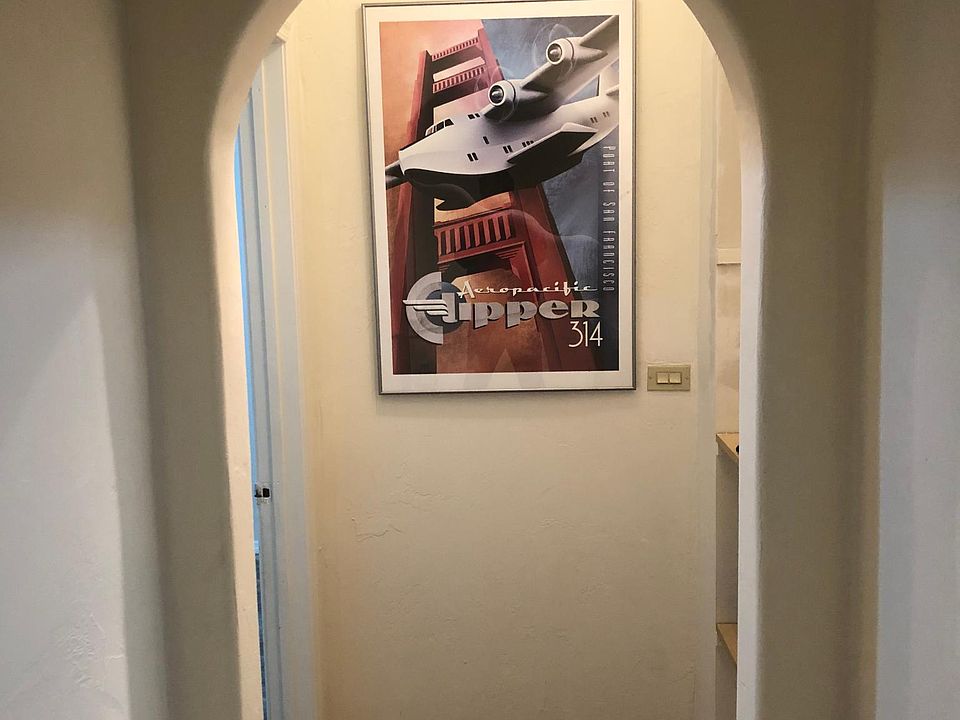 Hallway to bedroom and bathroom
