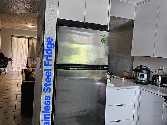 Stainless Steel Fridge and Range