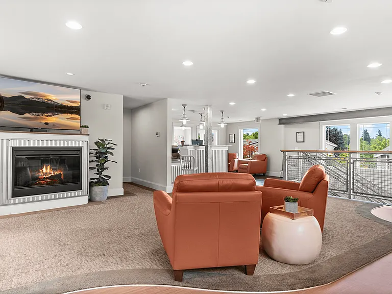 Relax in our inviting resident lounge with fireplace and plenty of natural light.
