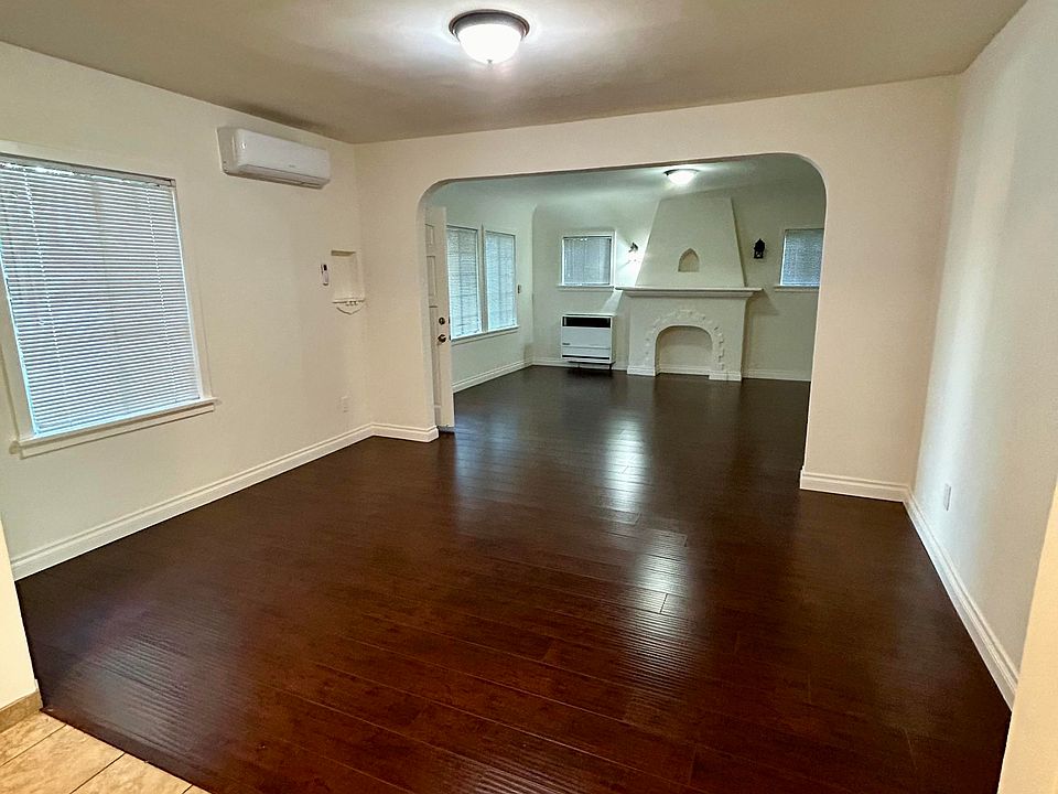 Open floorplan from kitchen, through dinning room, & living room