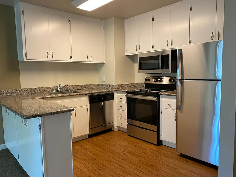Granite countertops and lots of cabinets space