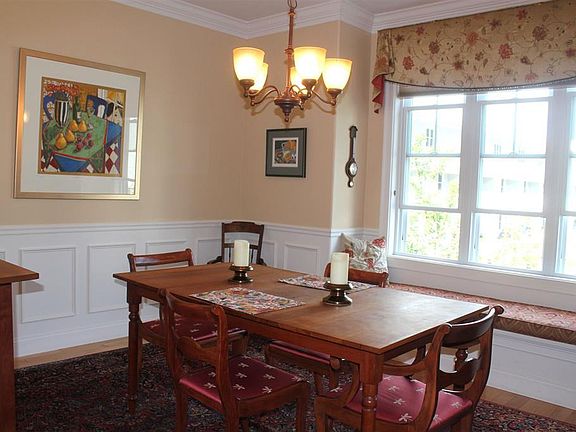 Dining room with cushioned banquette.