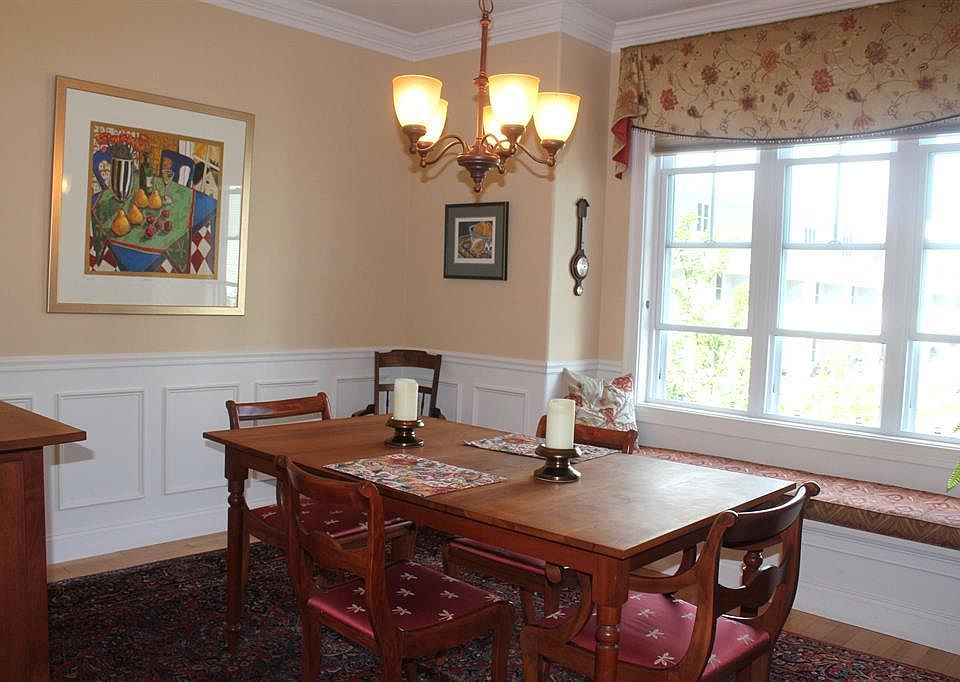 Dining room with cushioned banquette.