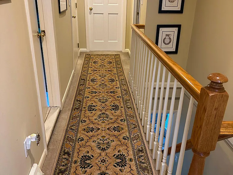Hallway and stairs to second floor room