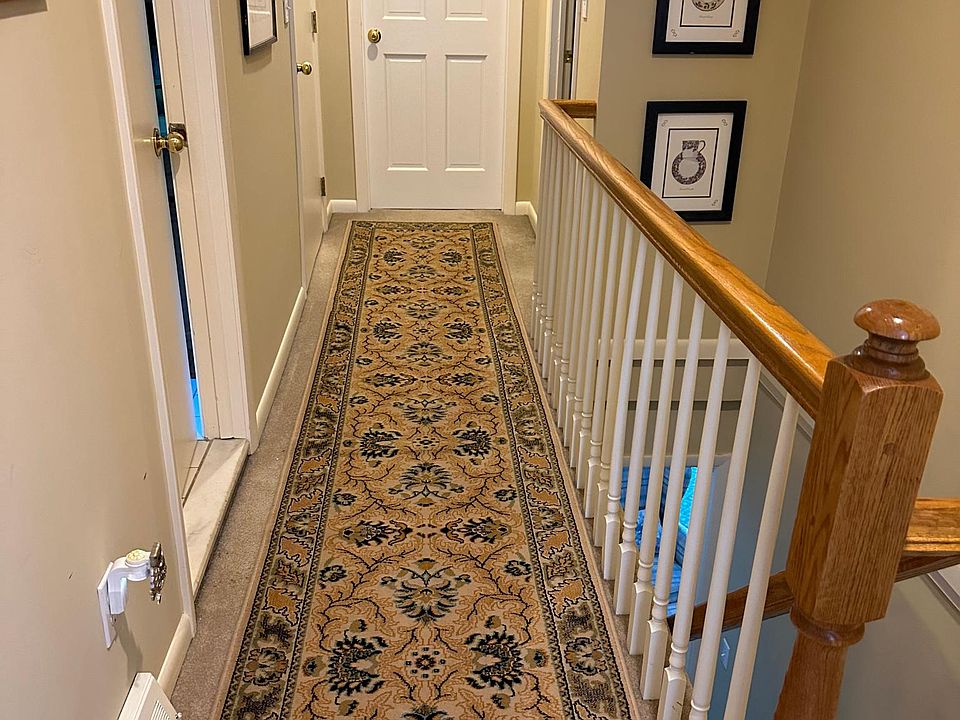 Hallway and stairs to second floor room