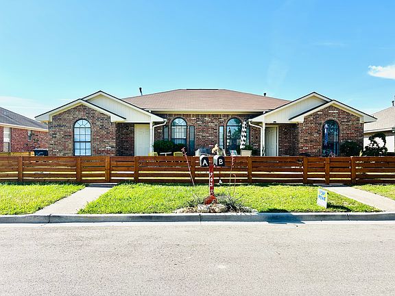 brand new fenced front yard with great privacy