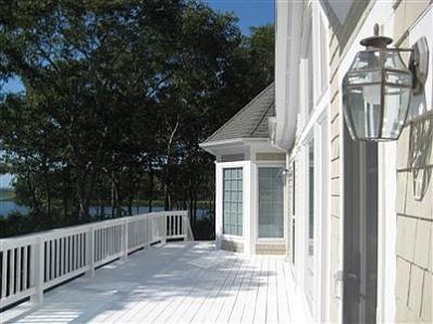 Another view of the deck leading to the steps to the back yard.