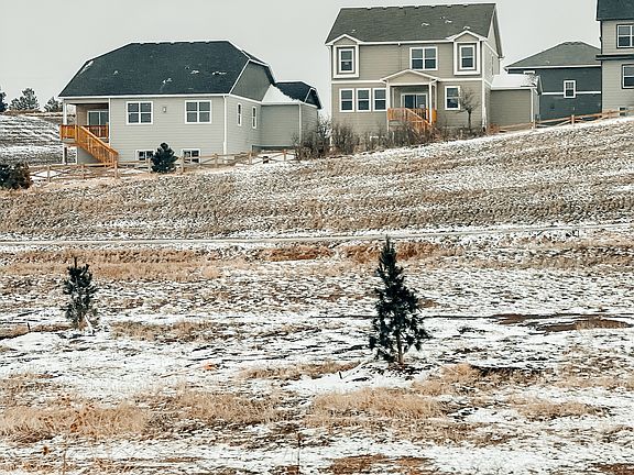 Home is fenced and landscaped, deck painted white - photos will be updated shortly