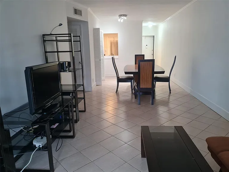 300 Golden Isles Dr #104 — Photo 2