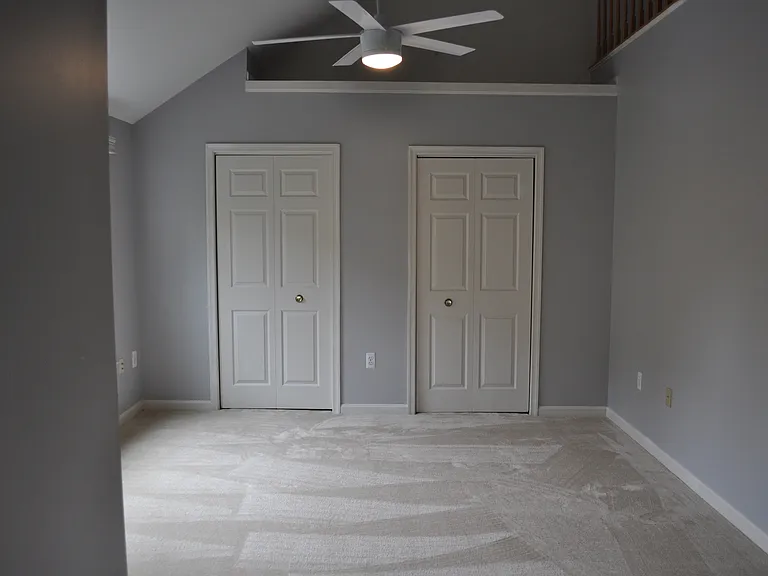 Primary bedroom on second floor with loft