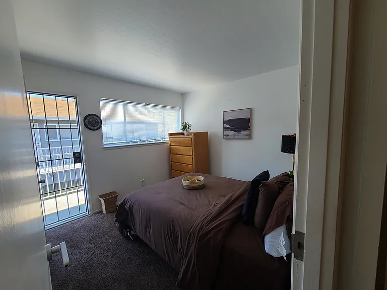 This bedroom is slightly smaller then the master room but it definitely makes up for it. Enjoy the breeze and allow the air to filter through your balcony private door while scrolling your emails on your laptop.