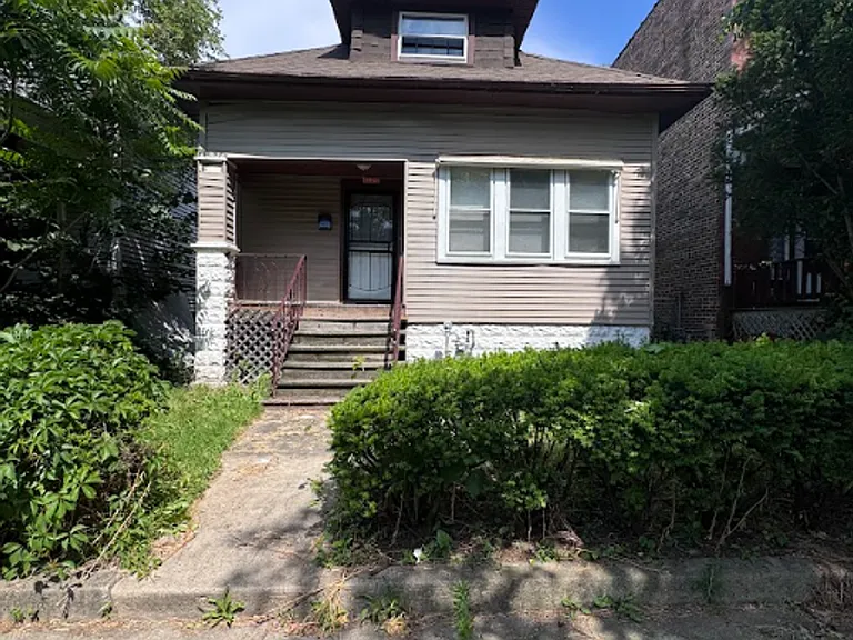 12219 S Lowe Ave — Photo 1