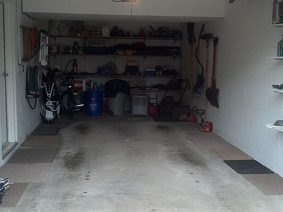 attached garage w/ shelves