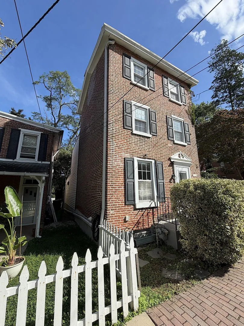 Stately Updated Three- Story Brick Colonial Now Available for Rent — Photo 1