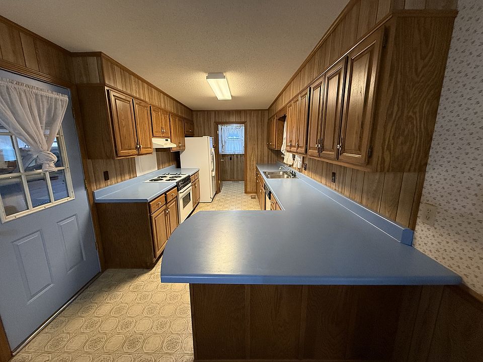 The kitchen with bar top!