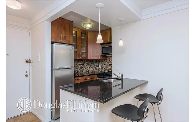 Sold by Douglas Elliman | media 17