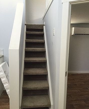 Stairs going up to loft 