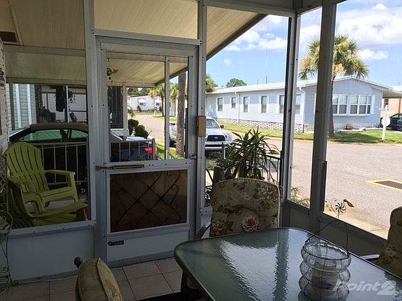 Lanai entrance from carport