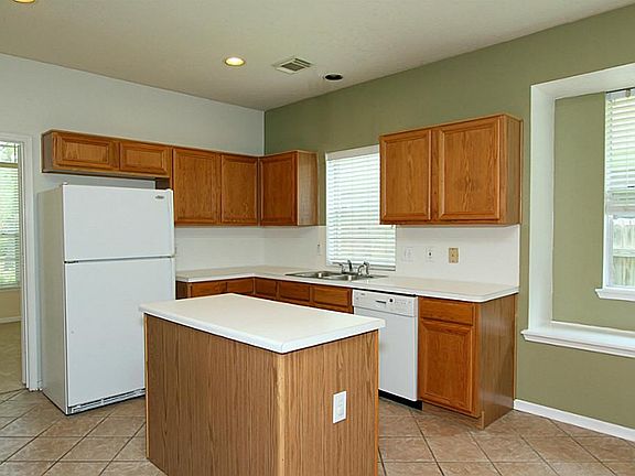Plenty of cabinet and counter space in this island kitchen!