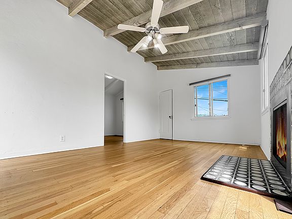 Living room with vaulted ceilings