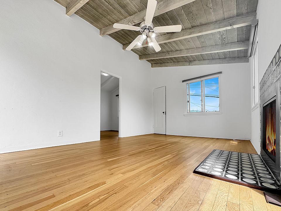 Living room with vaulted ceilings