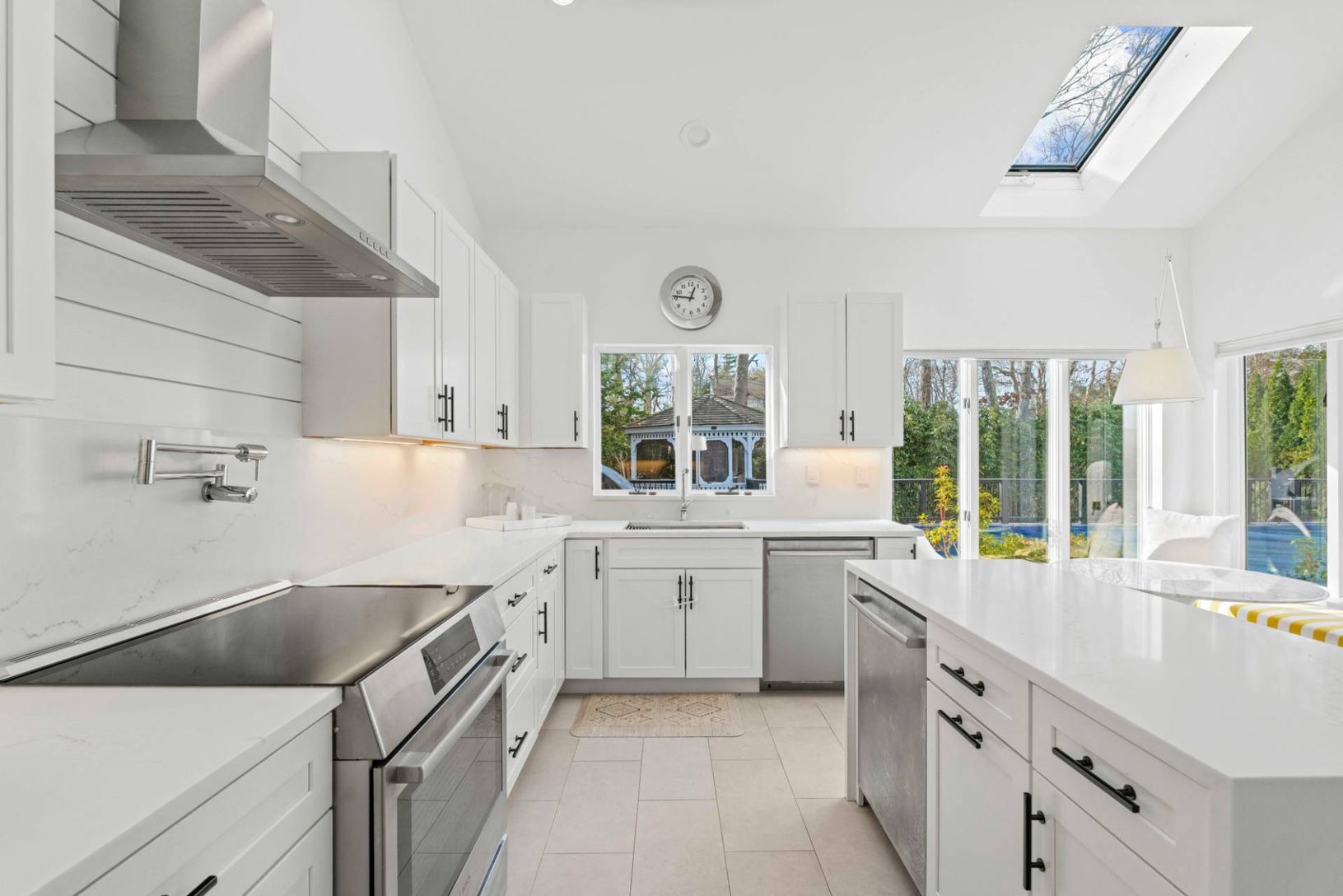 Chefs Kitchen with highend appliances, stainless steel finishes, and quartz counter tops