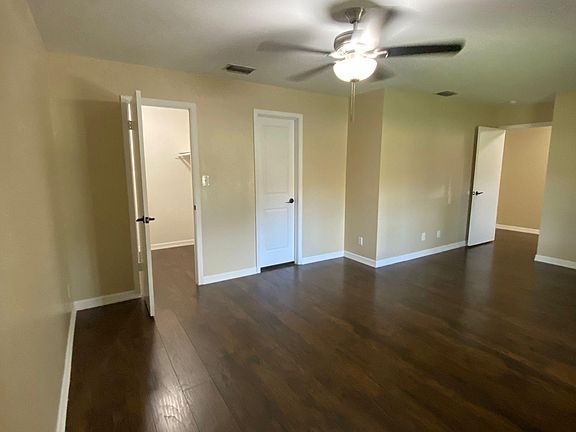 Primary bedroom. Closet on left. Bathroom in middle. Exit door on right.